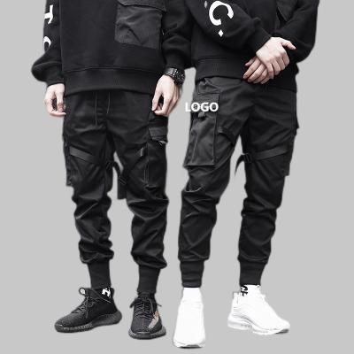 China Free Sample Men Multi-pocket Casual Harem Hip Pop Pants Male Casual Cargo Pants Men Streetwear Sweatpants New Hombre Fashion Cargo Pants for sale