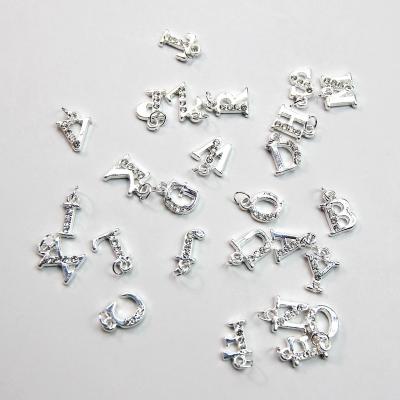 China Nail Charms Jewelry Wholesale Dropshipping Art Manicure Decorations Charms Trendy Letter Pendant Nail Jewelry A-Z Alphabet Silver Plated Alloy for sale