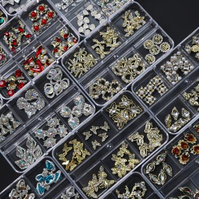 China Nail Charms 6 Grid Alloy Boxed Rhinestones Nail Bow Planet Bead DIY K9 Nail Jewelry Set Large Nail Art Charm Accessories for sale