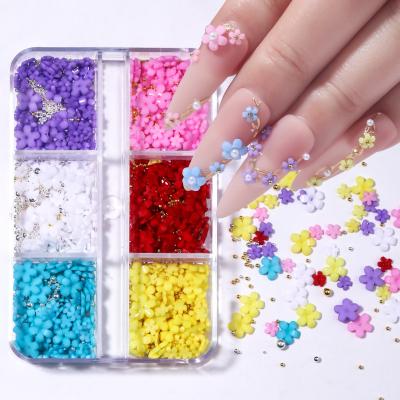 China Nail Charms Mixed Acrylic Bead Gem Kawaii Nail Supplies Jewelry 6 Grid Size 3D Flower Nail Charm Decoration Metal Bead for sale