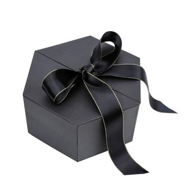 China Wholesale Recyclable Decorate Black Rigid Cardboard Folding Gift Paper Packaging Box With Ribbon for sale