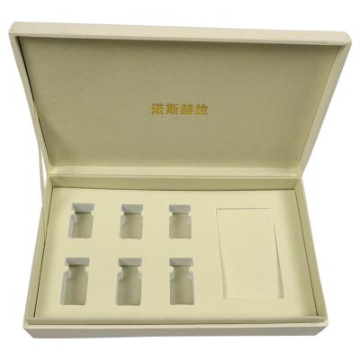 China Factory custom design makeup packing box cosmetic paper gift box for essential oil with cut out EVA/ foam inset for sale