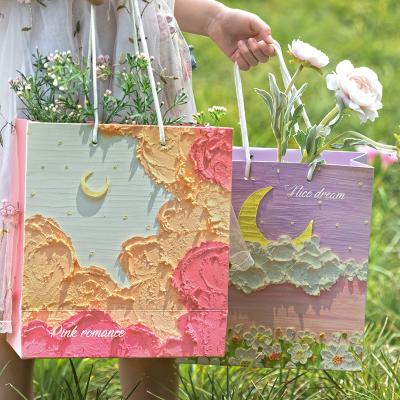 China Creative oil painting gift bag, artistic tote bag, exquisite festival men's and women's birthday bouquet packaging, gift paper bag for free for sale