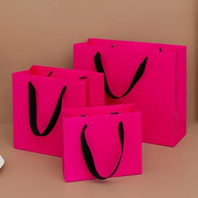 China Customized Printing Custom Paper Gift Bags for Your Business Needs for sale