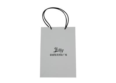 China ODM Paper Shopping Bag With Handles Protective Varnish FSC Approval for sale