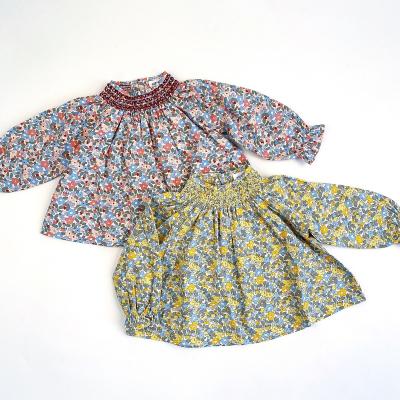 China Anti-pilling Floral Smock Baby Shirts Buttons For Toddler Girls Blouses Boutique Customization Infant Kids Shirts for sale