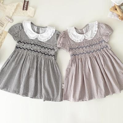 China Fashion washable vintage handmade smocked dress for baby plaid skirt babydoll kids dress for sale