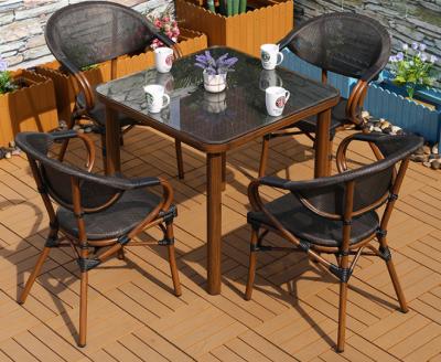 China Leisure Modern Outdoor Tables and Chairs Bar Commercial Street Balcony Tables and Chairs Cafe Milk Tea Shop Outdoor Mesh Furniture Sets for sale