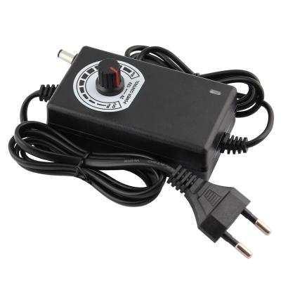 China UniversalÂ   Wholesale Cheap Universal Adjustable Voltage Switching Power Supply DC 3 - 12V 2A 24W With DC Connector for sale