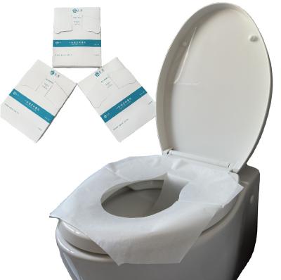 China New Promotion Color Disposable Flushable 1/4 Times White Color Cloth Cushion Disposable Toilet Seat Waterproof Mat Cover Paper for sale