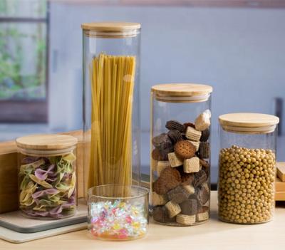 China Modern Borosilicate Glass Storage Jar With Cork Wood Lid , Glass Canisters With Cork Lid for sale