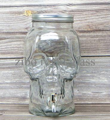 China Sustainable 5L Skull-shape Beverage Glass Beverage Dispenser With Silver Screw Lid for sale