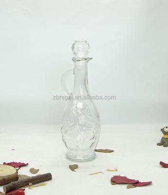 China Sustainable 500ml Clear Glass Olive Oil Cruet Bottle With Handle for sale