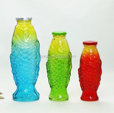 China Viable Different Size Fish Shape Color Glass Animal Bottles With Screw Lid for sale