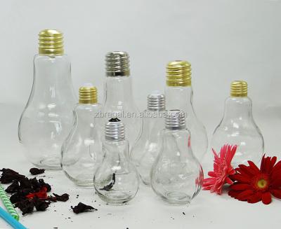 China Sustainable Clear Bulb Shaped Beverage Spice Bottle Glass Jar With Metal Lid for sale