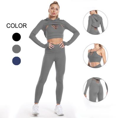 China Sustainable Workout Clothes For Women 3 Pcs Crop Top With Criss Cross Hat Butt Gaiters Sports Bra Exercise Yoga Equipment Lifting Set for sale