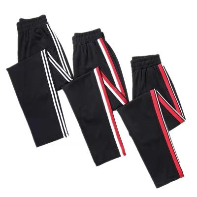 China Spring, summer and autumn new stripe thin women's breathable black casual pants large size women's side loose straight tube sweatpants for sale