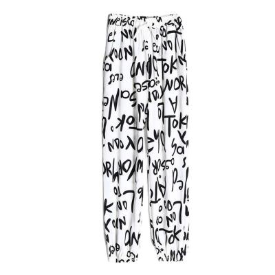 China Spring 2022 Spring 2022 Women's Casual Ice Silk Loose Pants Letter Graffiti Leggings Viable New for sale