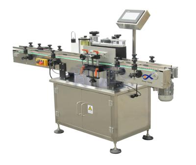 China CLOTHING XT-2510 Round Water Bottle Labeling Machine With CE Certificate for sale