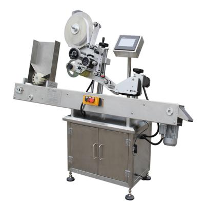 China XT-2610 GARMENT Horizontal Small Labeler Machine Envelope Labeler for Pen/Pencil/Wax Candle for sale