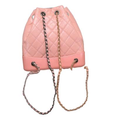 China The other 22 new series soft rhombus retro drawstring cowhide leather small backpack chain fashion casual stray school bag for sale