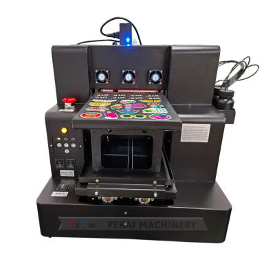 China Garment Stores High Precision A4 UV Flatbed Printer Varnish Printing UV Inkjet Printer for sale