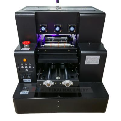 China Garment Shops Automatic A4 Size UV ​​Flatbed Printer For Phone Case Printing With Varnish Function for sale