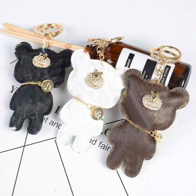 China Hot Selling Luxury Cute Leather Key Chains Luxury Designer Bear Keychain Design Pattern Bear Key Chain for sale