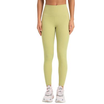 China New Breathable Suction Ribbed High Elastic Shape Yoga Wear Running Fitness Hip Lift Yoga Pants Slimming Sports Tights Women for sale