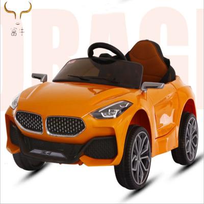 China Ride on Toy Children Electric Car Boys and Girls Baby Swing Box Sit People Four-Wheel Drive for sale