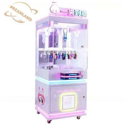 China Dreamland New Clamp Vending Game Machine Win Prize Game Machine Rotating Clip Gift Game Machine for sale