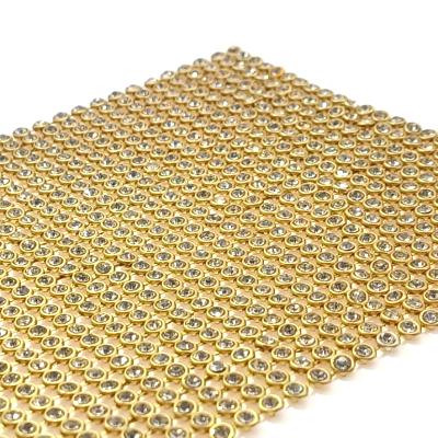 China Water Resistant Crystal Mesh Fabric Rhinestone Metal Fabric Apparel For Dress And Decoration for sale