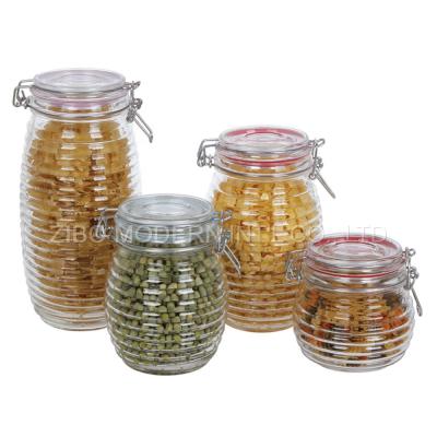 China Wholesale Sustainable Clear Decorative Round Air Tight Food Hinged Lid Storage Glass Jar With Lid for sale