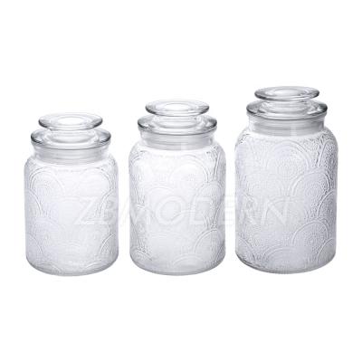 China Empty Retro Decorative Embossment Freshness Preservation Glass Food Container Storage With Lids for sale