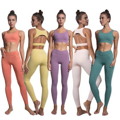 China Breathable Soild Color Women Sports Bra Yoga Gaiters Yoga Set Breathable Tops Workout Clothes Wholesale Seamless for sale