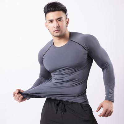 China Breathable Running Stretch Sweat Sportswear Workout Clothes Fitness Wear Men Gym Clothing for sale