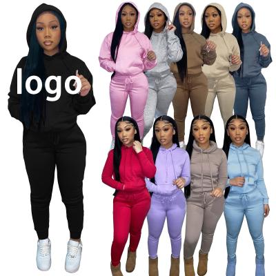 China Fashionable Fashion Hot Selling Void Woman Jogging Custom Made Polyester Tracksuit Women Sets Tracksuits Women for sale