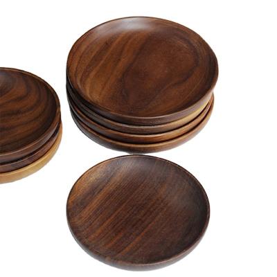 China Eco-friendly Natural Wooden Steak Serving Customized LOGO Wholesale Souvenir Round Walnut Wooden Dinner Dish for sale