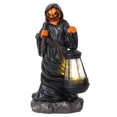 China Christmas Decoration Halloween Resin Grim Reaper Statue for Home Decor, Solar Ghost Pumpkin Face Statue Lamp with Table Ornaments for sale