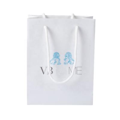 China Handmade Customize Food Grade White Fancy Handle Design Kraft Paper Bag Shopping Printing With Your Own Logo for sale