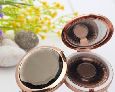 China Portable High End Double Sided Folding Cosmetic Eyelash Box Mirror Metal Round Beauty Quicksand Daily Makeup OEM Tools Logo for sale