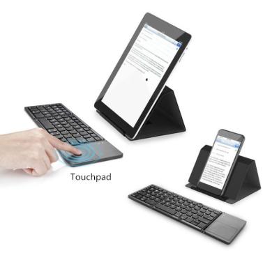 China Hot Selling Mini Wireless Foldable Keyboard With Rechargeable Portable Touchpad Wireless For Android IOS Windows PC Tablet for sale