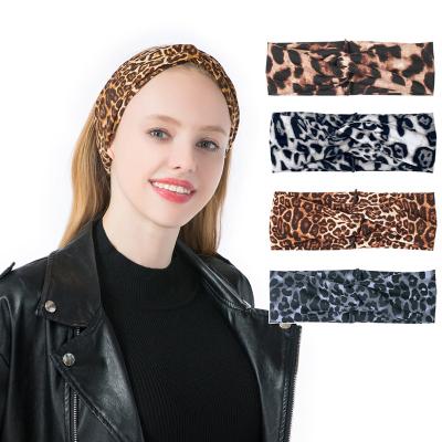 China Fashion Custom OEM Cross Knotted Leopard Shower Spa Face Wash Headband For Women for sale