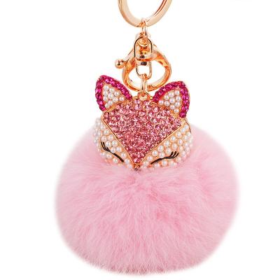 China Hademade Fashion Bag Car Key Chain Accessories Crystal Fox Head Rabbit Hair Tassel Alloy Pendant Key Chain For Women for sale