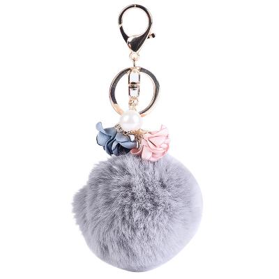 China Hademade imitation of small flower fabric pearl ball hairy hairy ball pendant key chain for sale