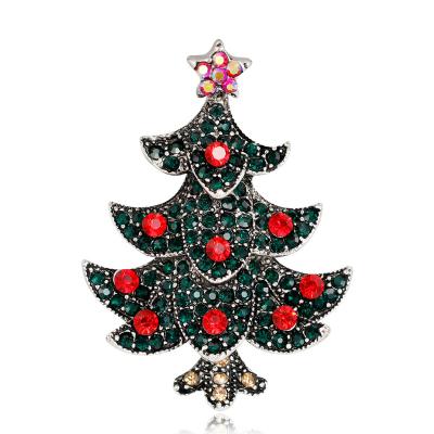 China OEM Holiday Accessories Christmas Zinc Alloy Element Pins Brooches Rhinestone Christmas Tree Brooches For Women for sale