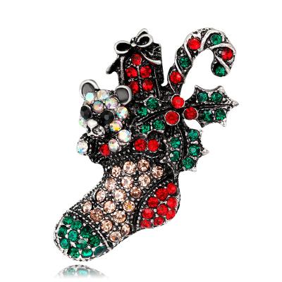 China Custom Zinc Alloy Christmas Gifts Clothes Decoration Corsage Crystal Santa Stocking Shape Zinc Alloy Brooches for sale