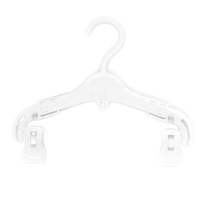 China Child Non-slip Environmentally Friendly Expandable Hanger With Clip White Hanger Multifunctional Non-slip Hanger for sale