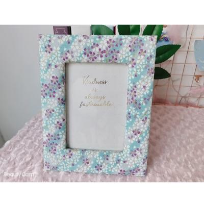 China Handmade Photo Frame Light Blue Printing Wood Fabric Size Custom Photo Frame For Living Room for sale