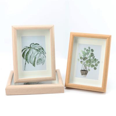 China Handmade creative stereo hollow photo frame 6 7 8 10 16 inch A4 wall hanging picture frame customization for sale